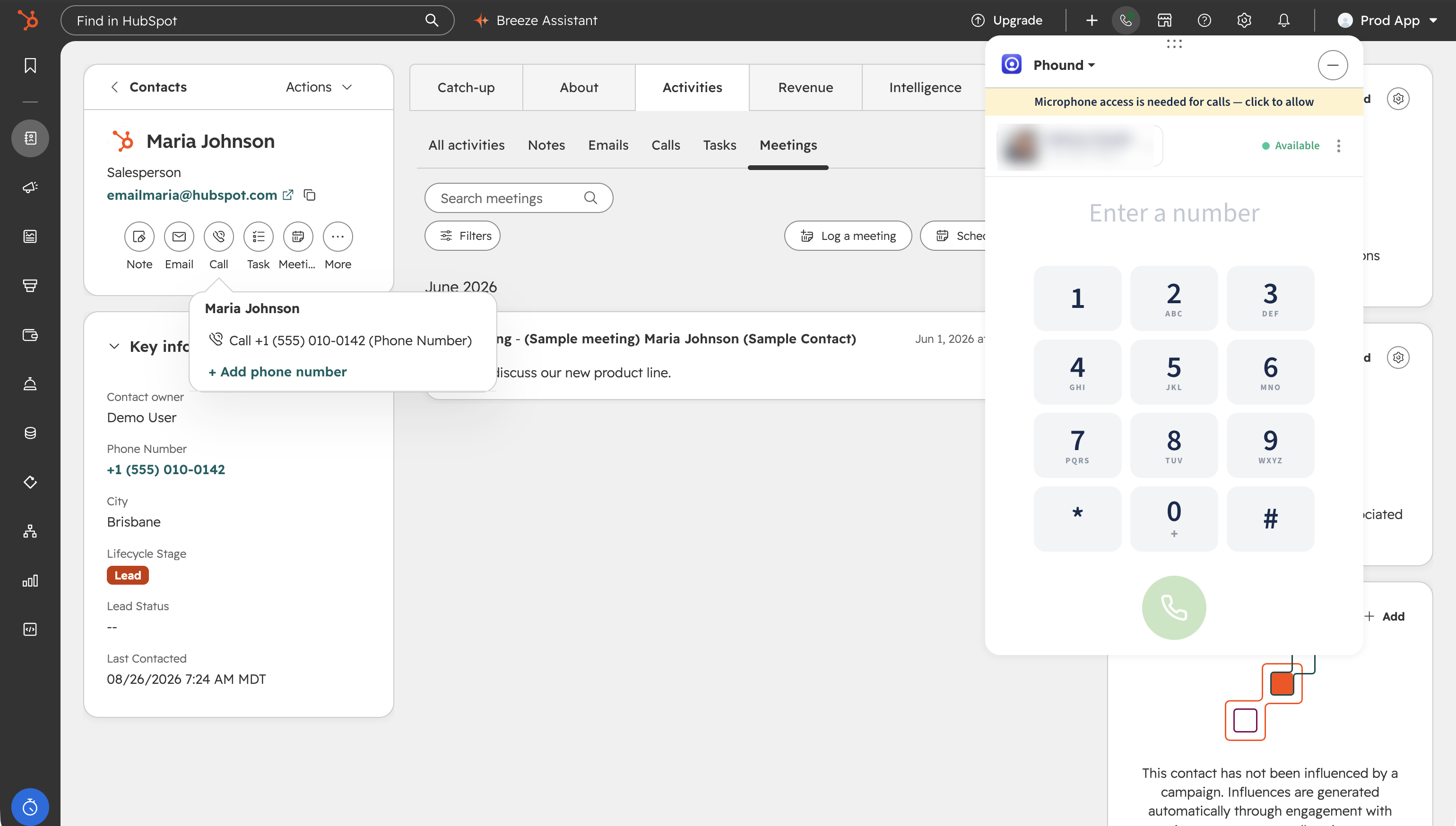 A HubSpot contact record with the call panel open, showing the Phound dialer with a keypad and the line it calls from